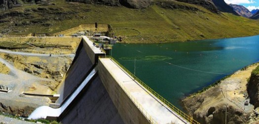 View along the top of a dam and spillway.