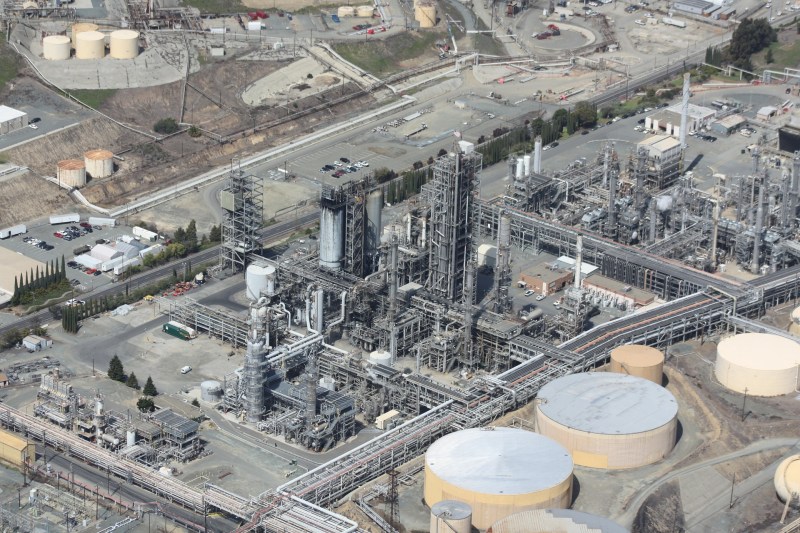 Oil refinery with storage tanks.