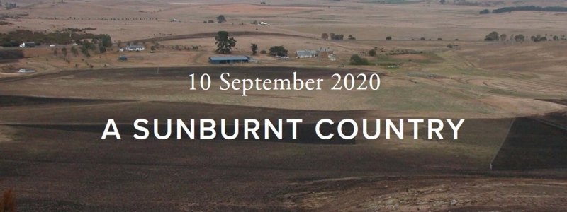 A Sunburnt Country. Plowed fields and grasslands in the summer.