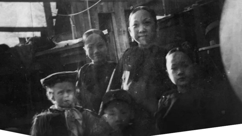 Asian American Old West. Five children, including four who are Chinese, standing in front of a building in Deadwood, first established as a mining town in South Dakota, undated.