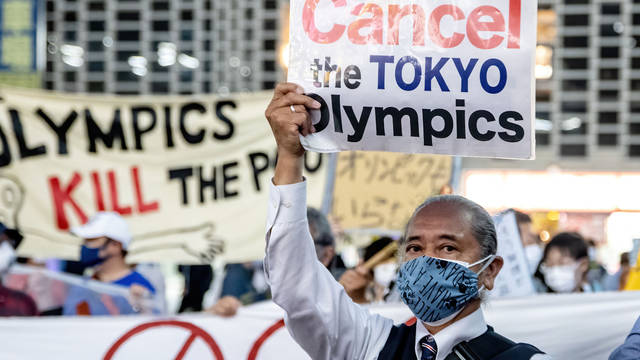 Tokyo demonstration. Cancel the Tokyo Olympics. Olympics KILL the Poor.