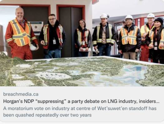 Leaders stending around a map table.