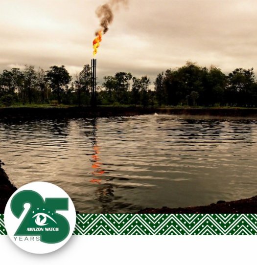 Amazon Watch-Burnoff flame across dark waters.