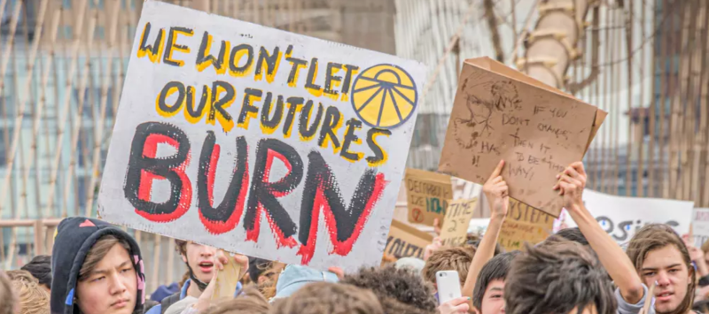 Students march to demand climate action in New York City on March 25, 2022